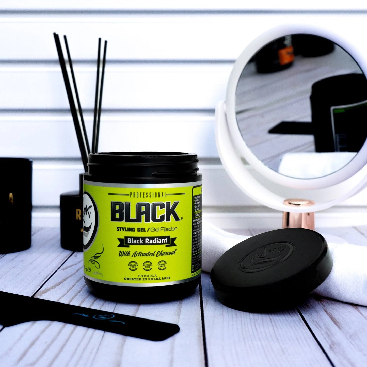 Rolda - Gel para peinar el cabello de color negro, 17,63 oz